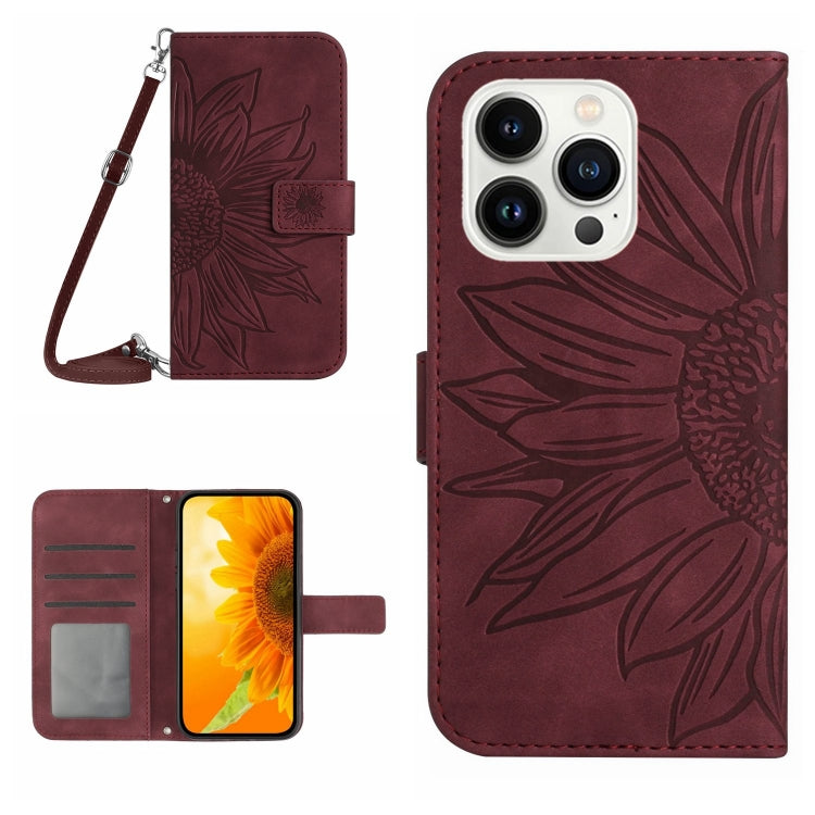 For iPhone 15 Pro Skin Feel Sun Flower Embossed Flip Leather Phone Case with Lanyard(Wine Red) - iPhone 15 Pro Cases by buy2fix | Online Shopping UK | buy2fix